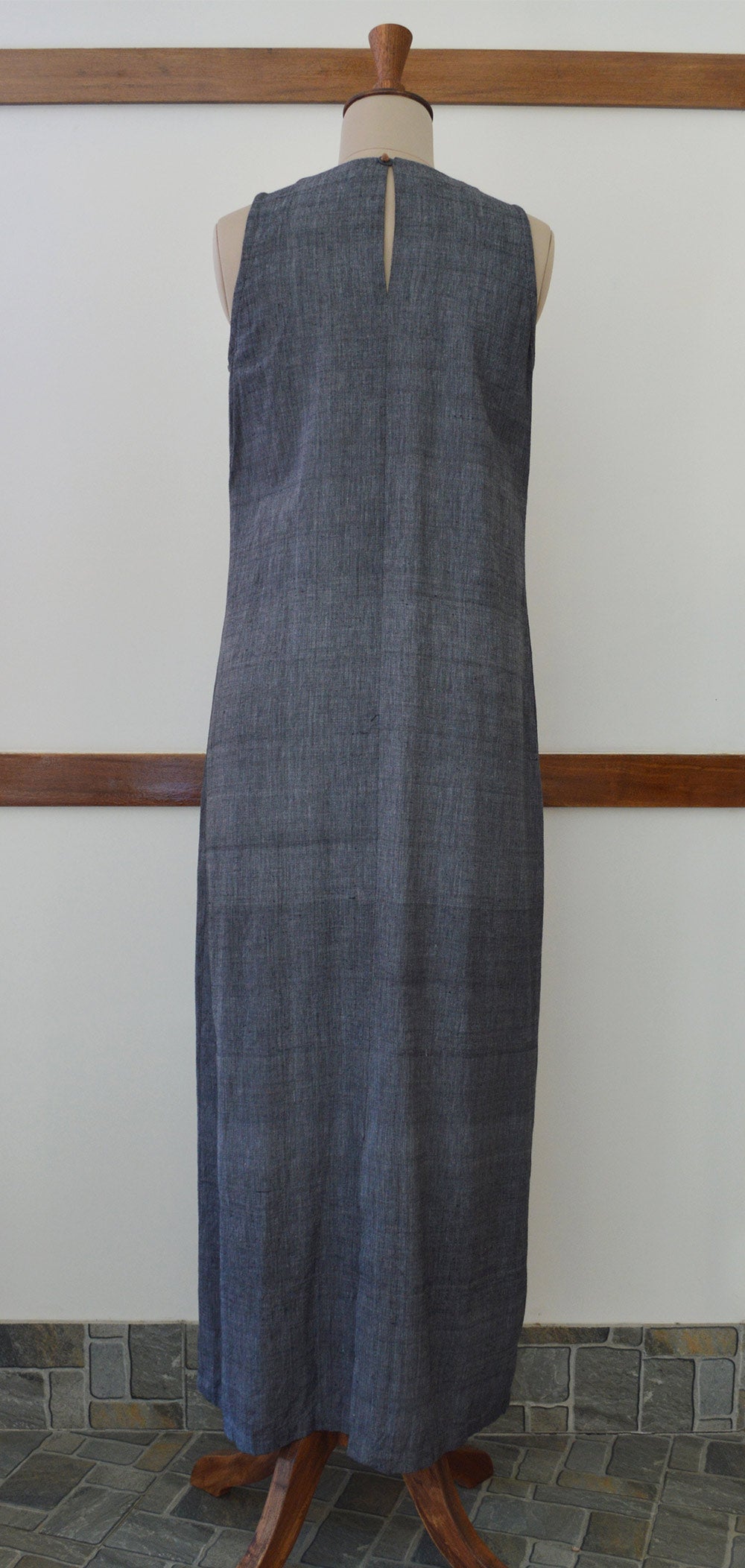 Close up back view of Handwoven Pleated maxi dress, designed by Khumanthem Atelier