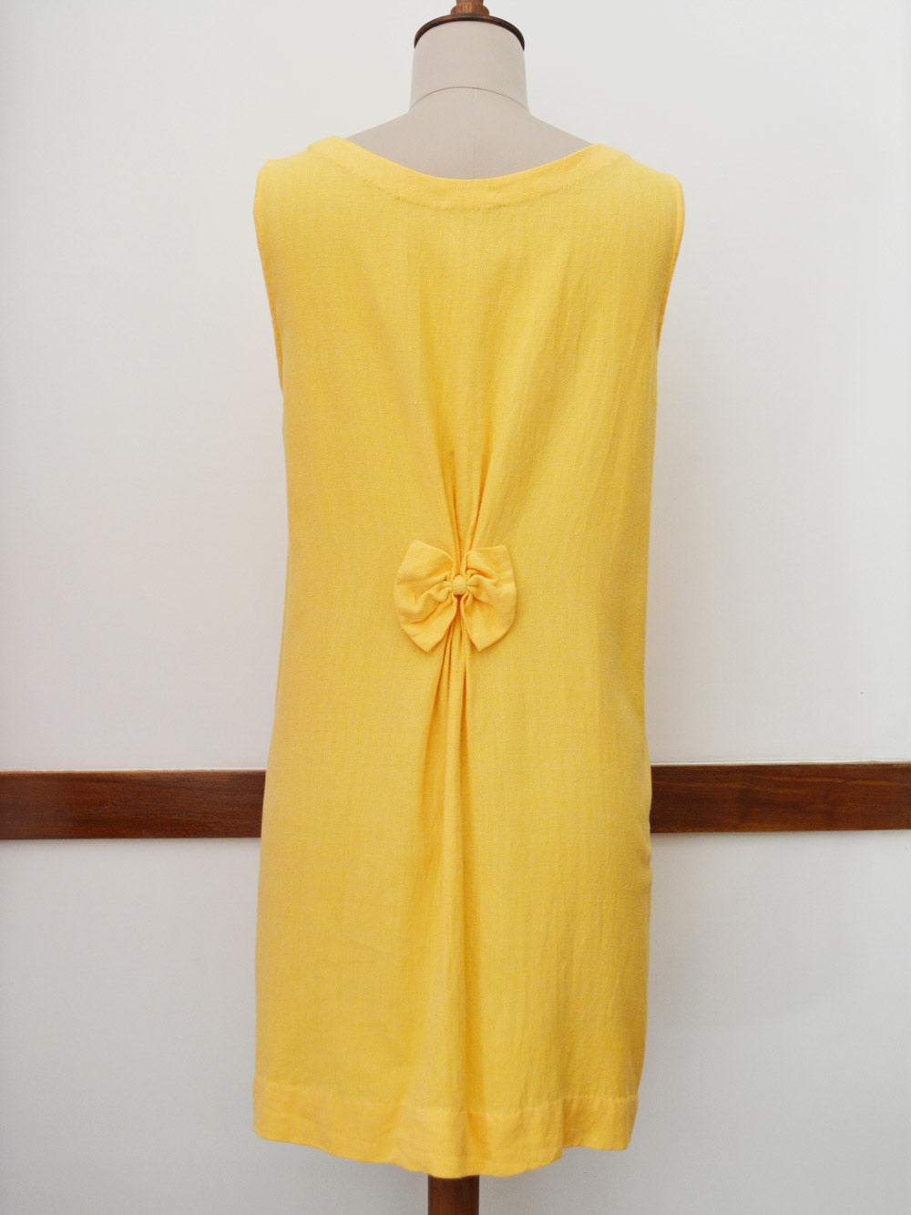 close up back view of Handwoven Shift Dress with bow back, designed by Khumanthem Atelier