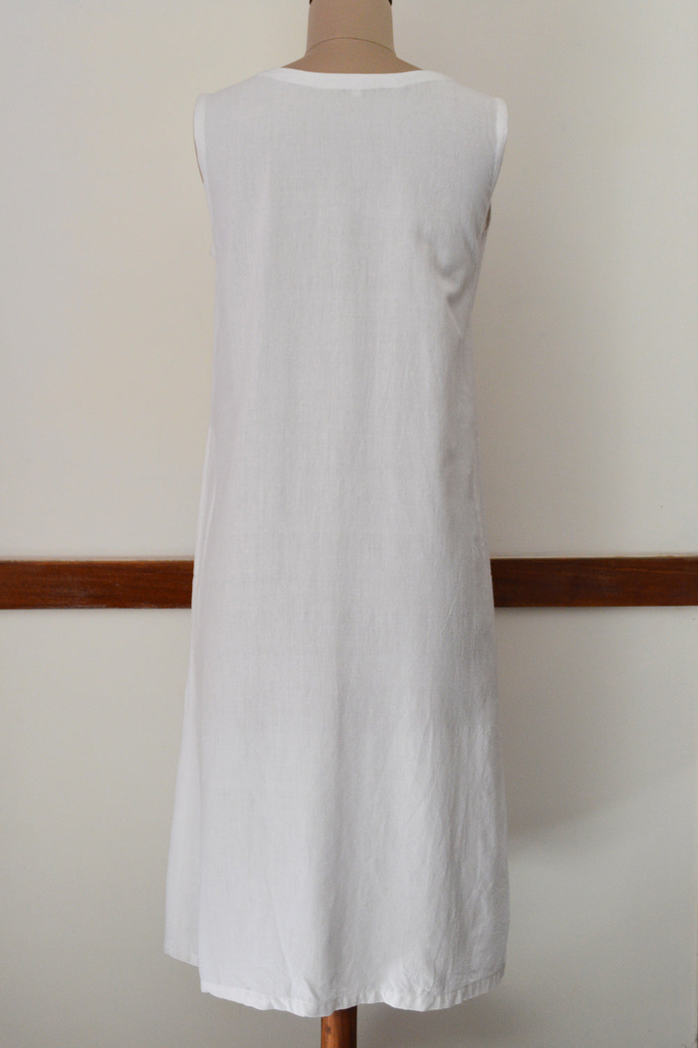 Close up back view of Handwoven Temple border design Deep pockets Tunic dress, designed by Khumanthem Atelier