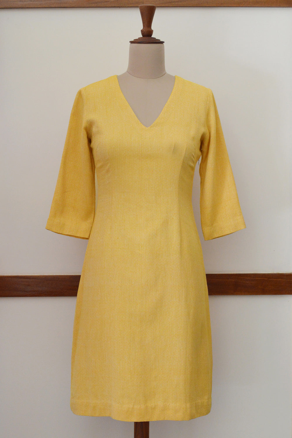 Close up front view of the Handwoven Fitted dress with crescent cut out back, designed by Khumanthem Atelier