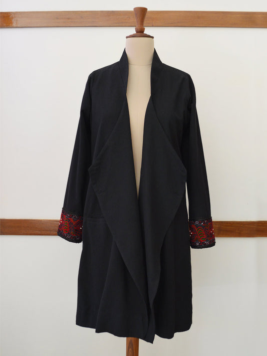 Full front view of the Hand embroidered long coat "mapan naiba motif", designed by Khumanthem Atelier