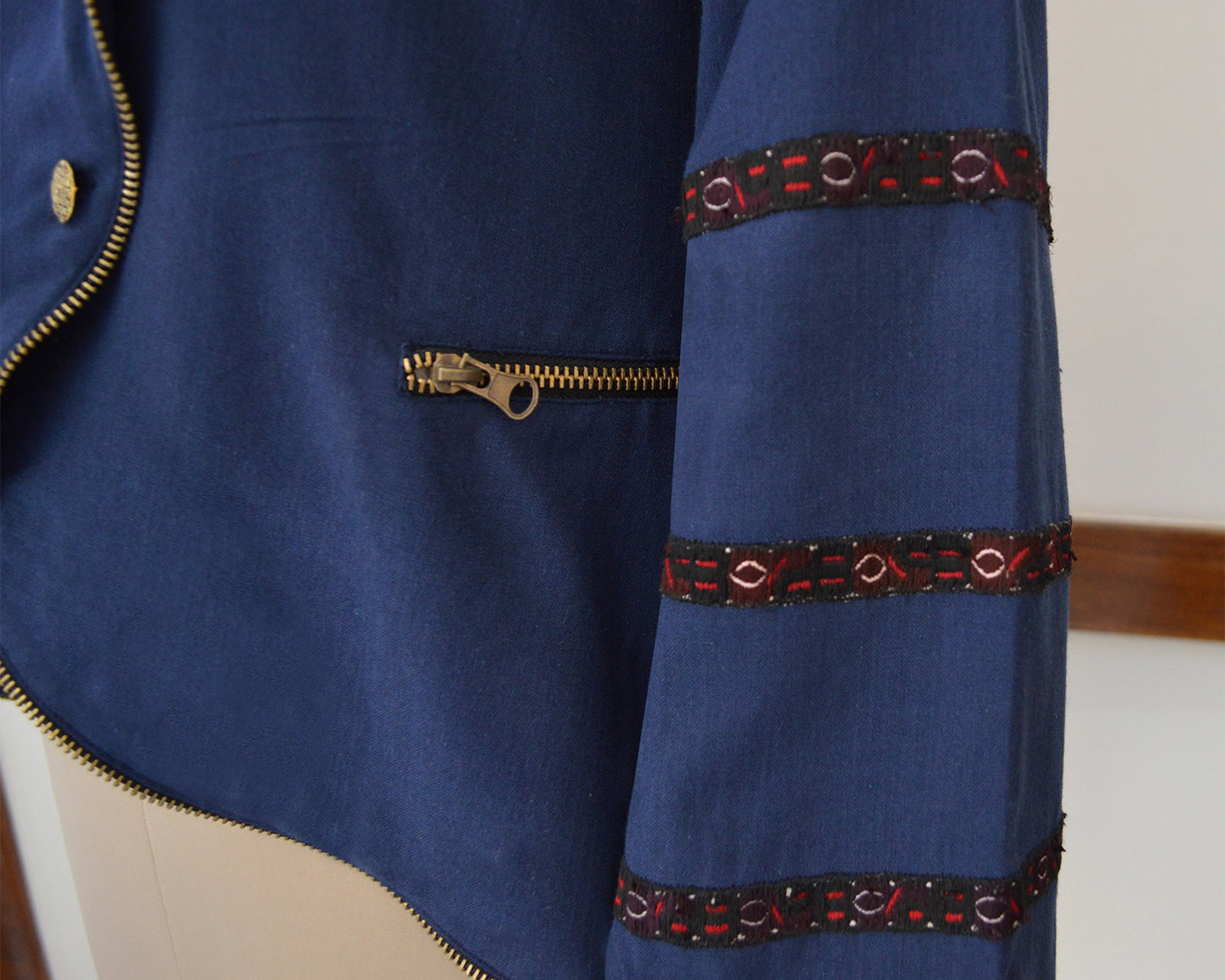 Close up view of Hand embroidered details on the jacket, designed by Khumanthem Atelier