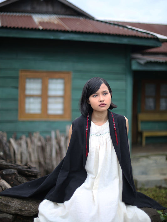 Handwoven Sleeveless shrug with braided detail on collar, designed by Khumanthem Atelier