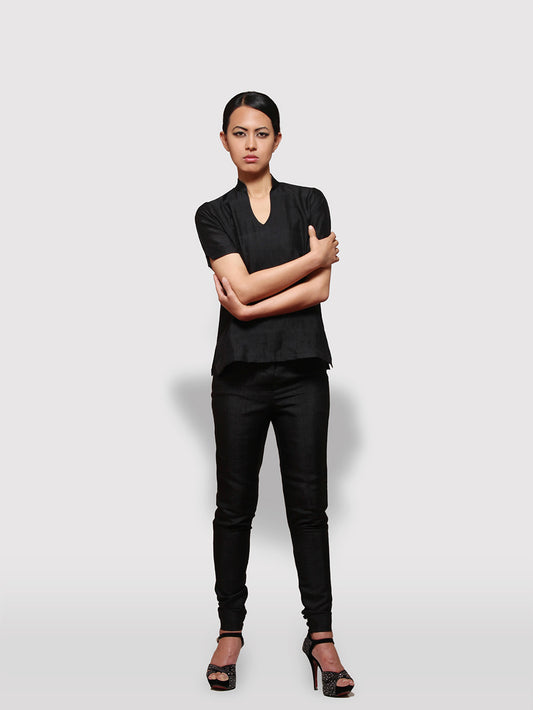 View of model wearing Tight fitting trouser made from 100% pure mulberry silk handwoven and designed by Khumanthem Atelier