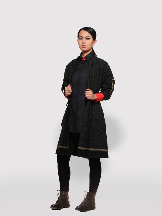 Double Belt Pleated overcoat with black and golden stripes designed by Khumanthem Atelier
