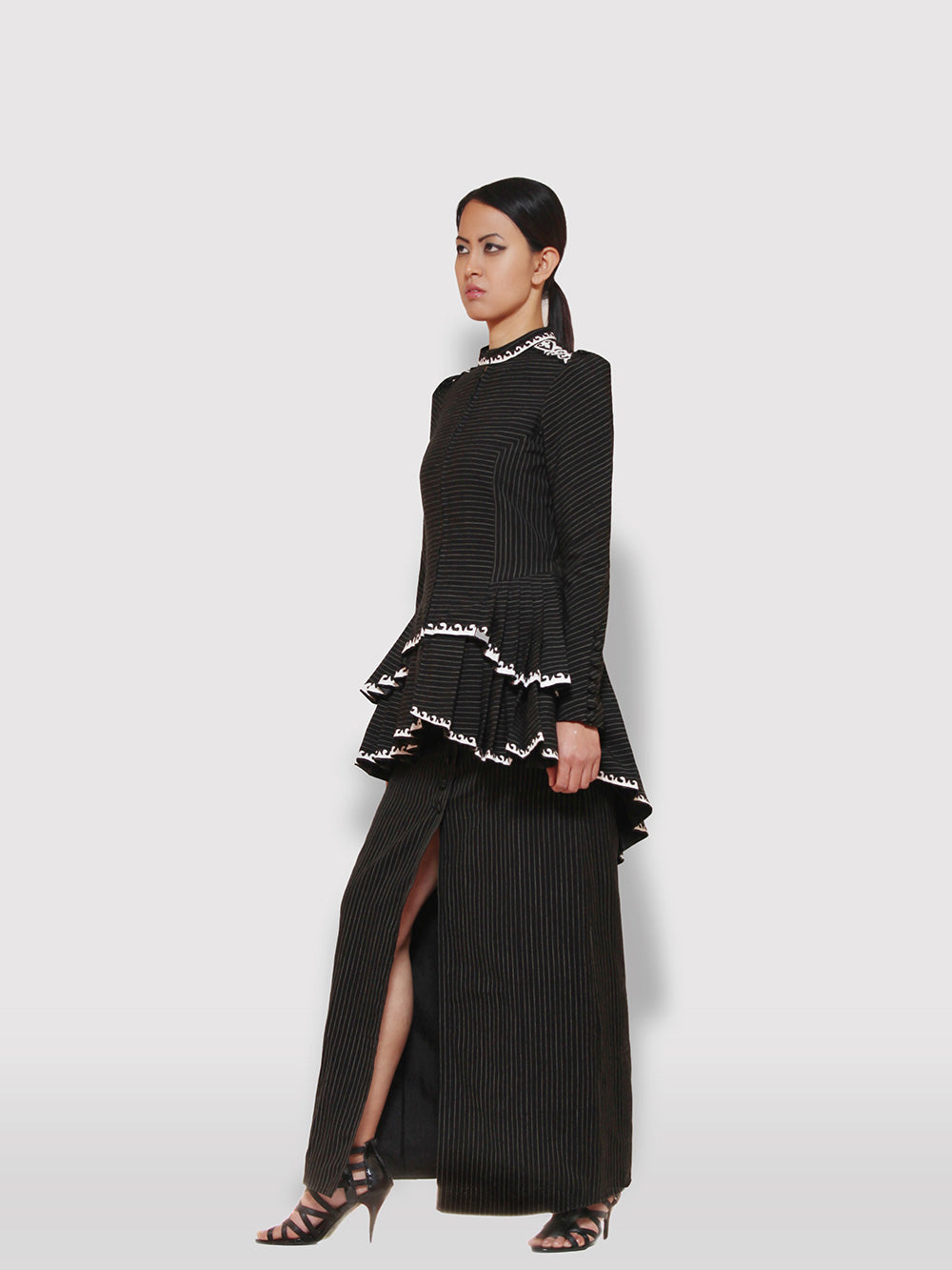 Black and gold stripe High- low tiered Jacket with applique work designed by Khumanthem Atelier