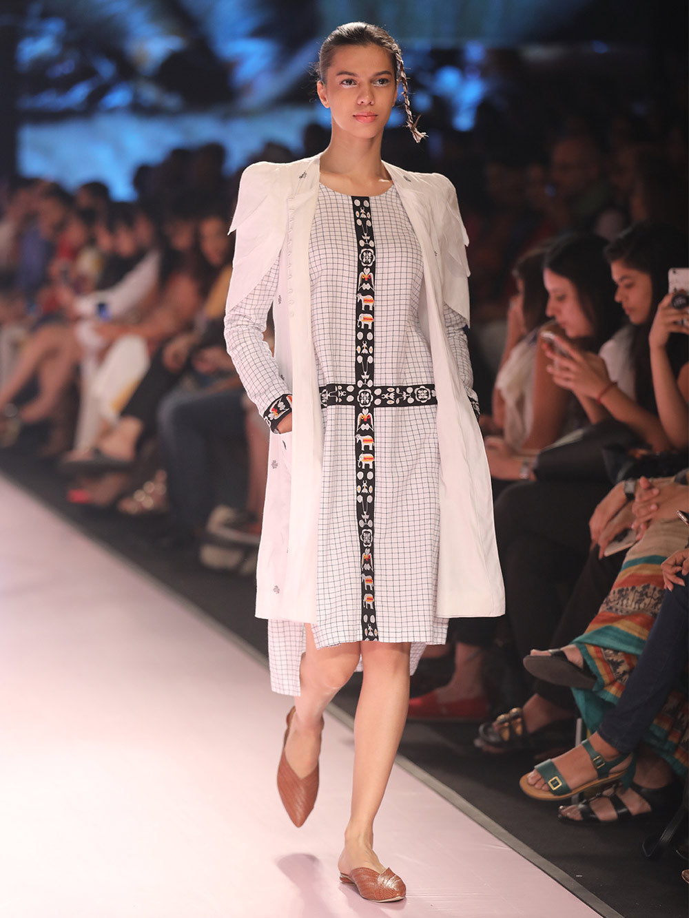 Ramp walk view of model wearing Front view of Checkered Tunic Dress (Shamee- Lanmee Motif) made from 100% pure cotton designed by Khumanthem Atelier