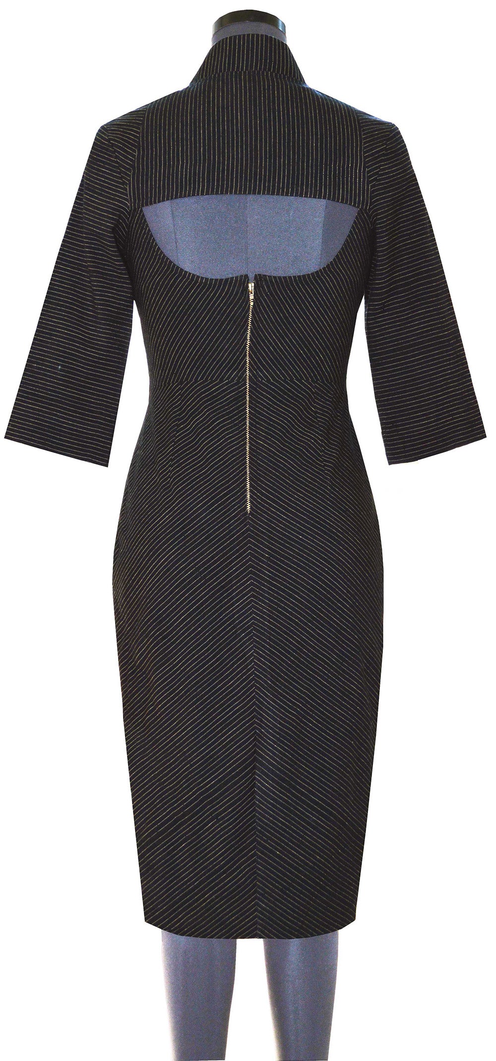 Back view of hanger shoot of Black and gold striped Paneled midi dress with cut out back designed by Khumanthem Atelier