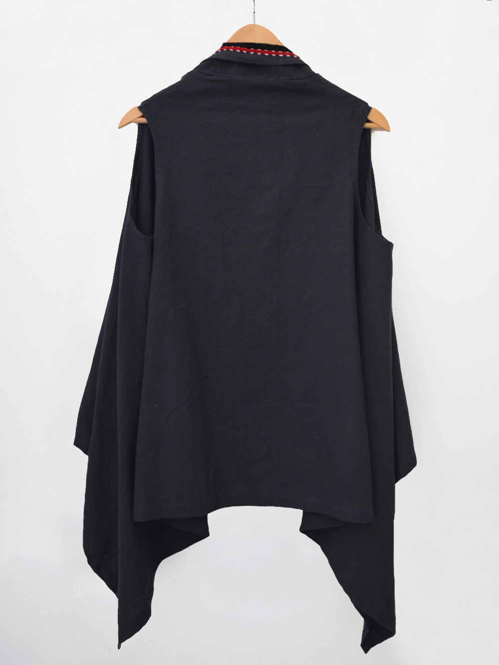 close up back view of Handwoven Sleeveless shrug with braided detail on collar, designed by Khumanthem Atelier