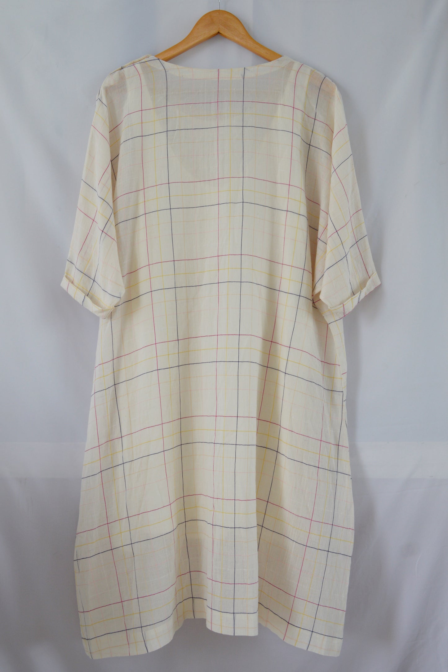 Hanger shoot of Handwoven Dolman sleeves cotton tunic, designed by Khumanthem Atelier, back view