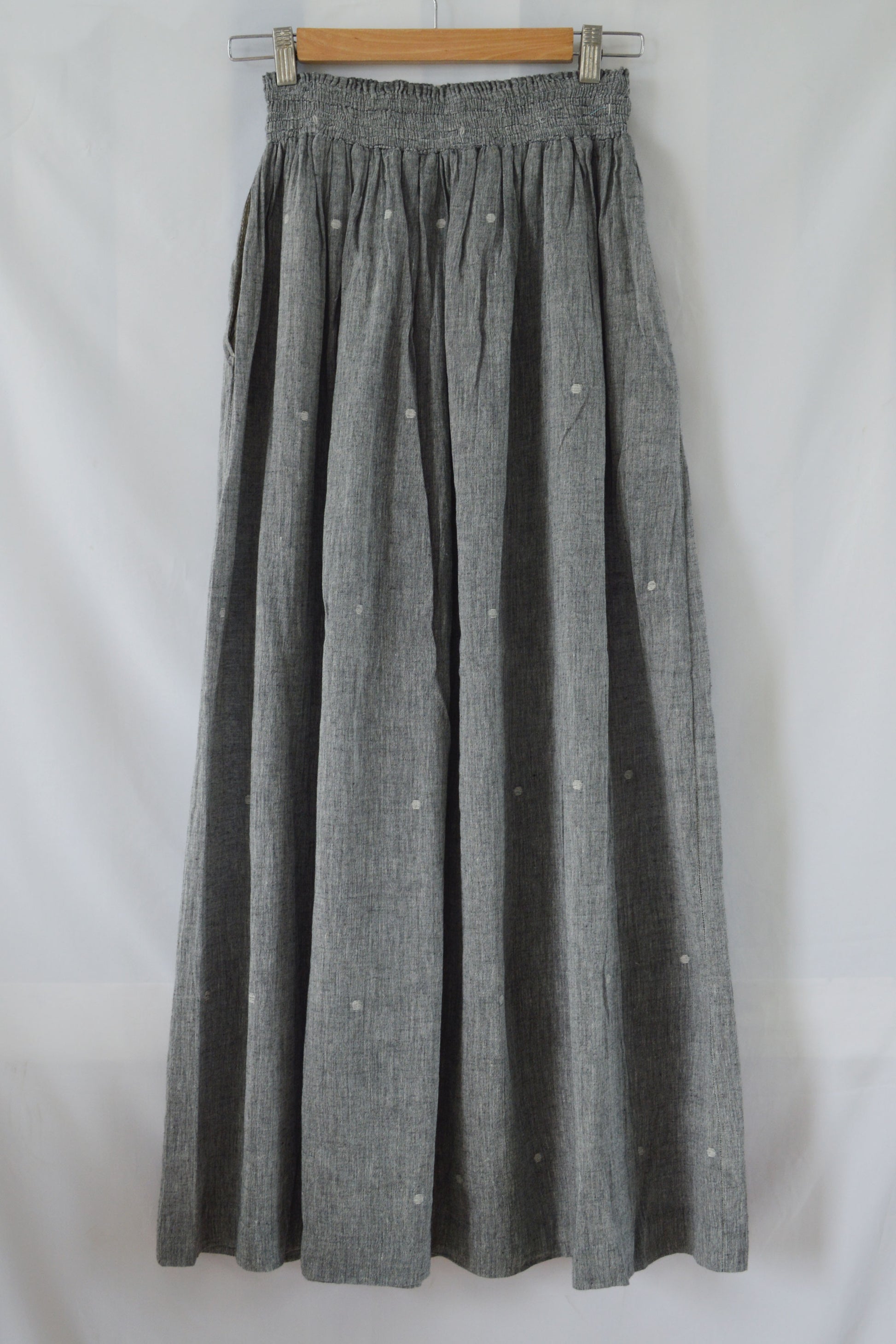 Hanger shoot front view Handwoven Elastane cotton skirt, designed by Khumanthem Atelier
