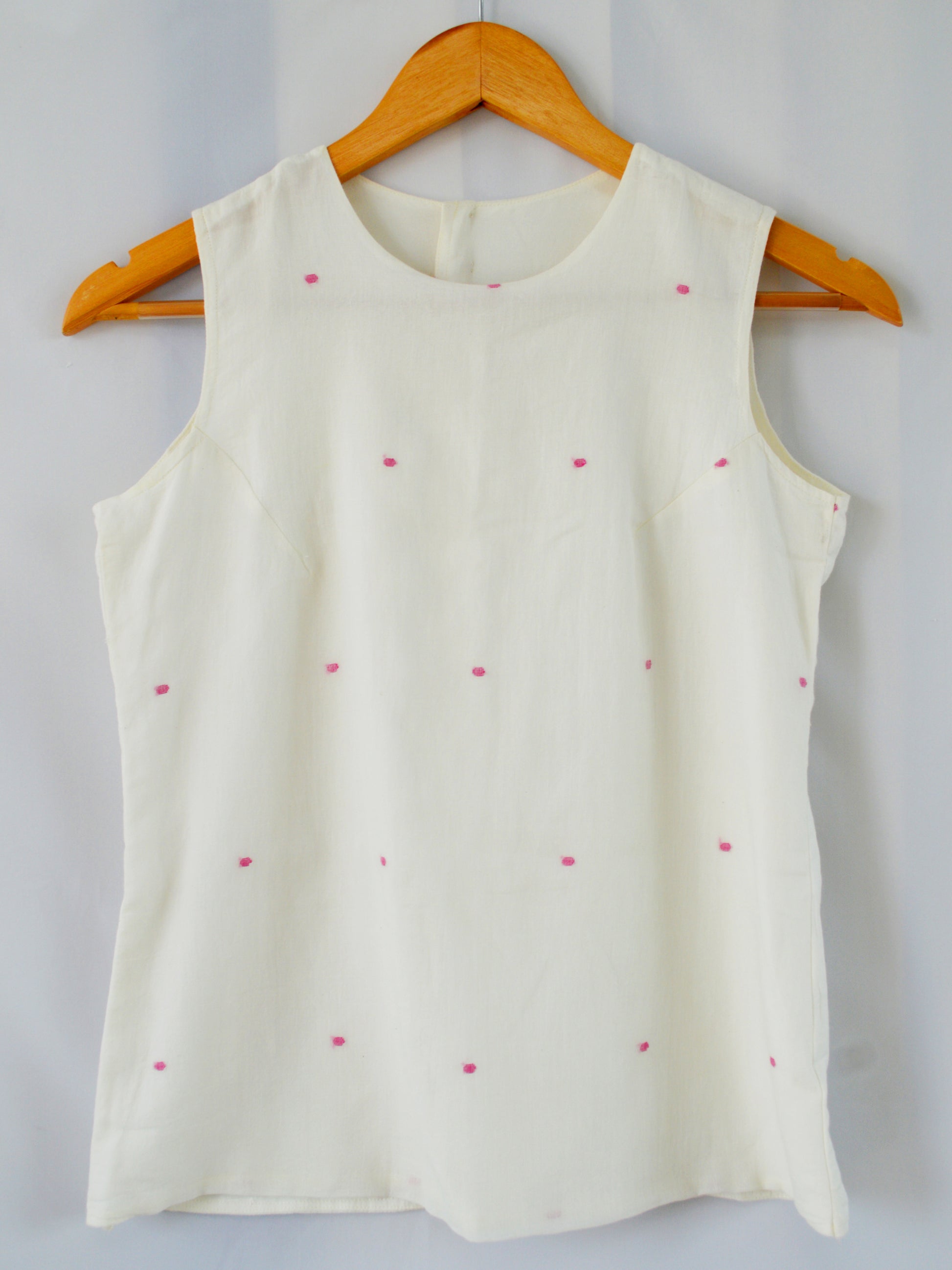 Front view of hanger shoot of Handwoven Back hooks sleeveless top