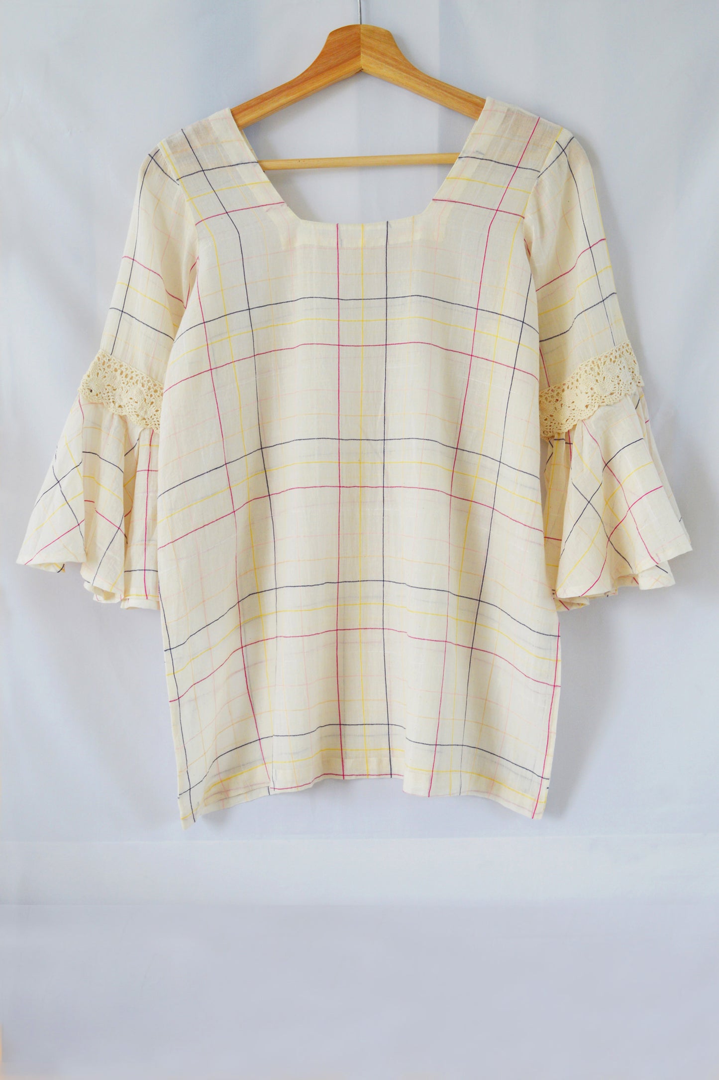 Hanger shoot Model wearing Handwoven Flounce sleeves cotton top, designed by Khumanthem Atelier, front view