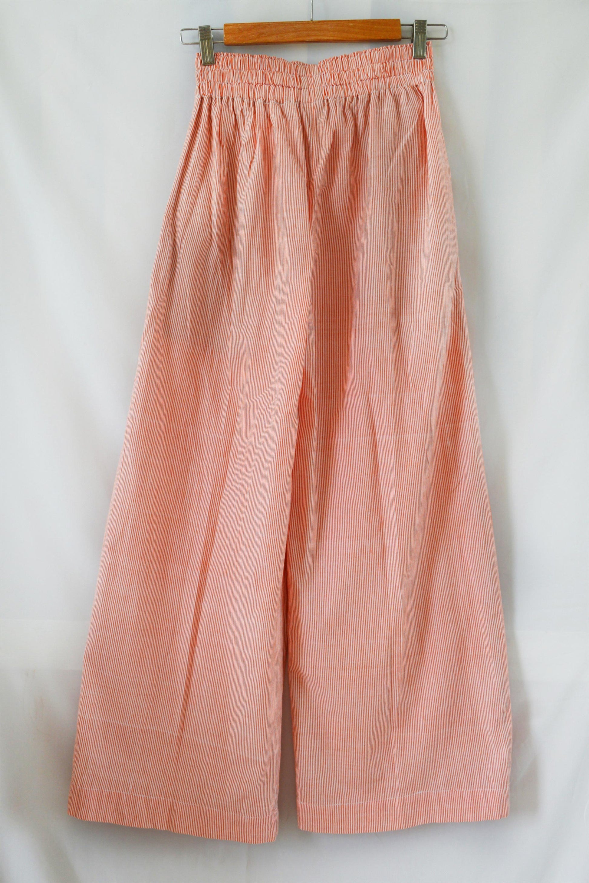 Back view hanger shoot Handwoven Cotton Striped culotte pants with side pockets, designed by Khumanthem