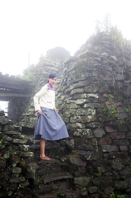 Model wearing Handwoven Short coat with traditional Chothe weave of Manipur, designed by Khumanthem Atelier