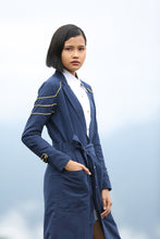 Load image into Gallery viewer, Model wearing Handwoven Trench coat with golden trims, designed by Khumanthem Atelier 