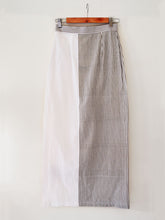 Load image into Gallery viewer, Back view of Striped Maxi Skirt with slit on the side made from 100% pure handwoven cotton, designed by Khumanthem Atelier