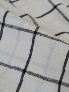 Close view of the material of checkered tops, designed by Khumanthem Atelier