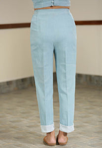 Back view of Handwoven cotton Mid waist turn-up hem trousers, designed by Khumanthem Atelier