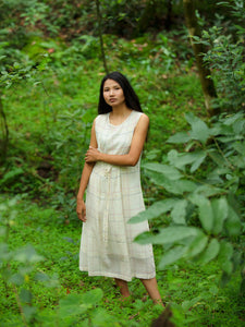 model wearing Handwoven Tie-up front Cotton Tunic Dress, designed by Khumanthem Atelier
