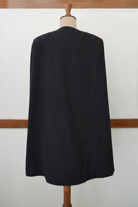 Close front view ofClose up back view of Handwoven Military Style Cape coat, designed by Khumanthem