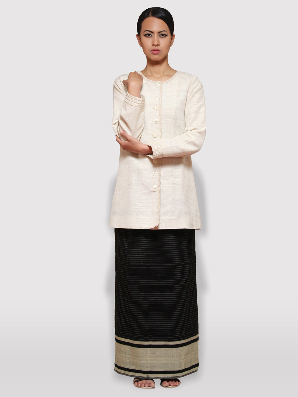 Handwoven Pinstripe wrap-around skirt inspired by traditional Meitei attire designed by Khumanthem Atelier