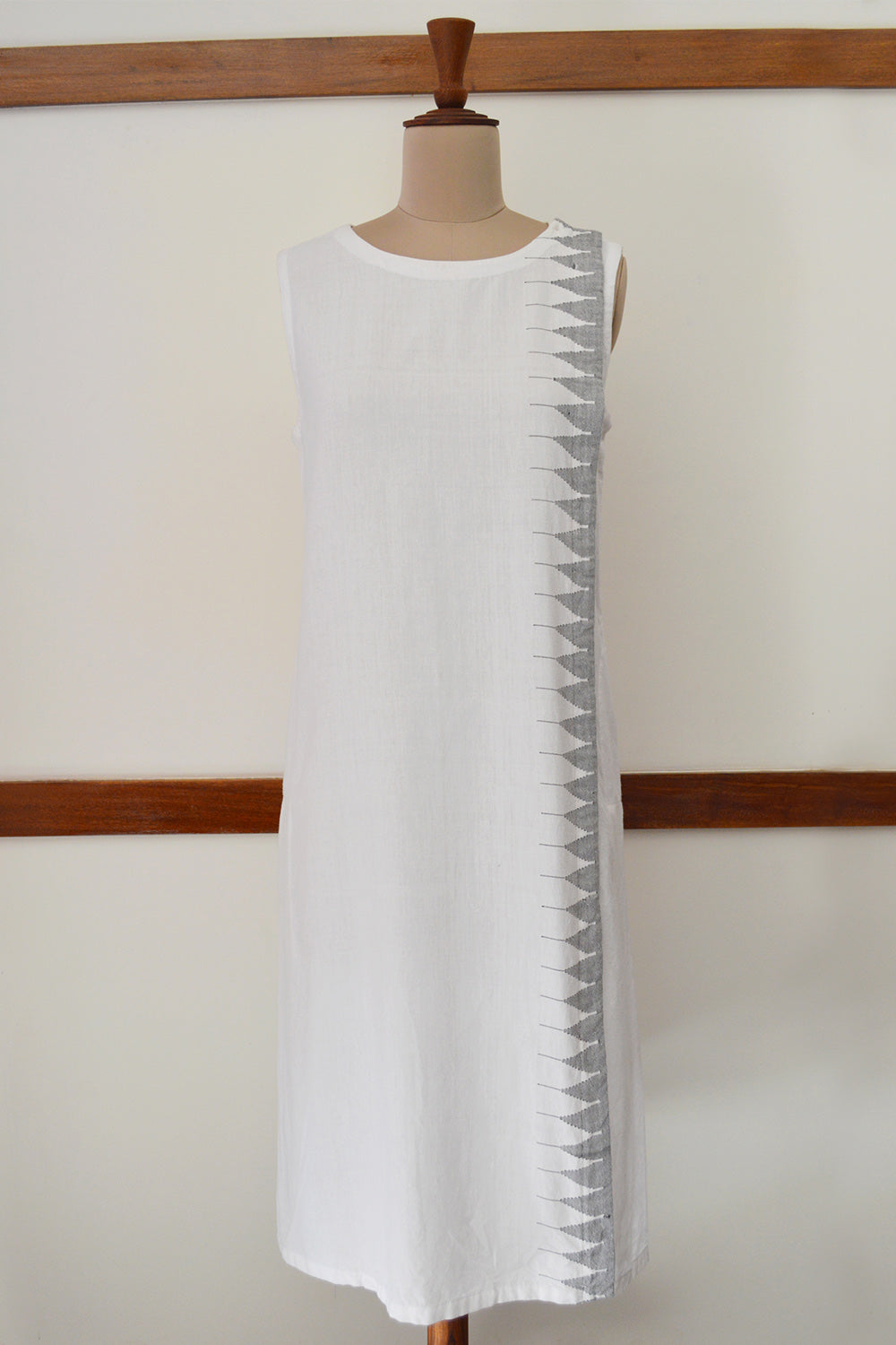 Close up front view of Handwoven Temple border design Deep pockets Tunic dress, designed by Khumanthem Atelier