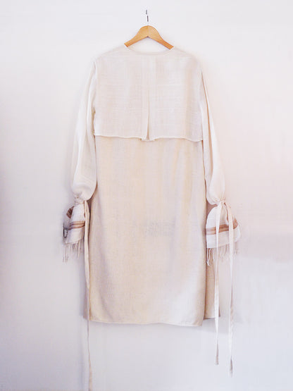 Back view of off white handwoven silk coat, designed by Khumanthem Atelier