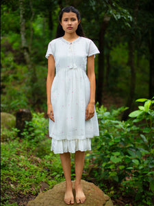 Model wearing Handmade Cotton Tunic Dress with sleeves, designed by Khumanthem Atelier, front view