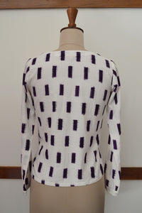 close up back view of the Handwoven Ikat Weave Top with Round Neck, designed by Khumanthem Atelier