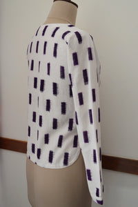 close up side view  of the Handwoven Ikat Weave Top with Round Neck, designed by Khumanthem Atelier