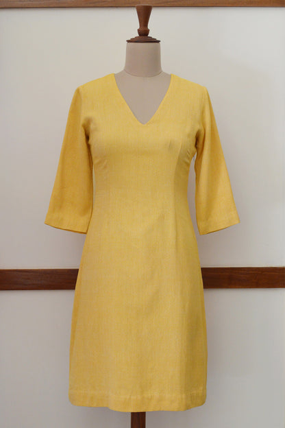Close up front view of the Handwoven Fitted dress with crescent cut out back, designed by Khumanthem Atelier