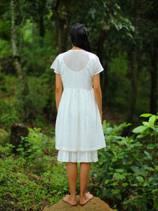 Model wearing Handmade Cotton Tunic Dress with sleeves, designed by Khumanthem Atelier, back view