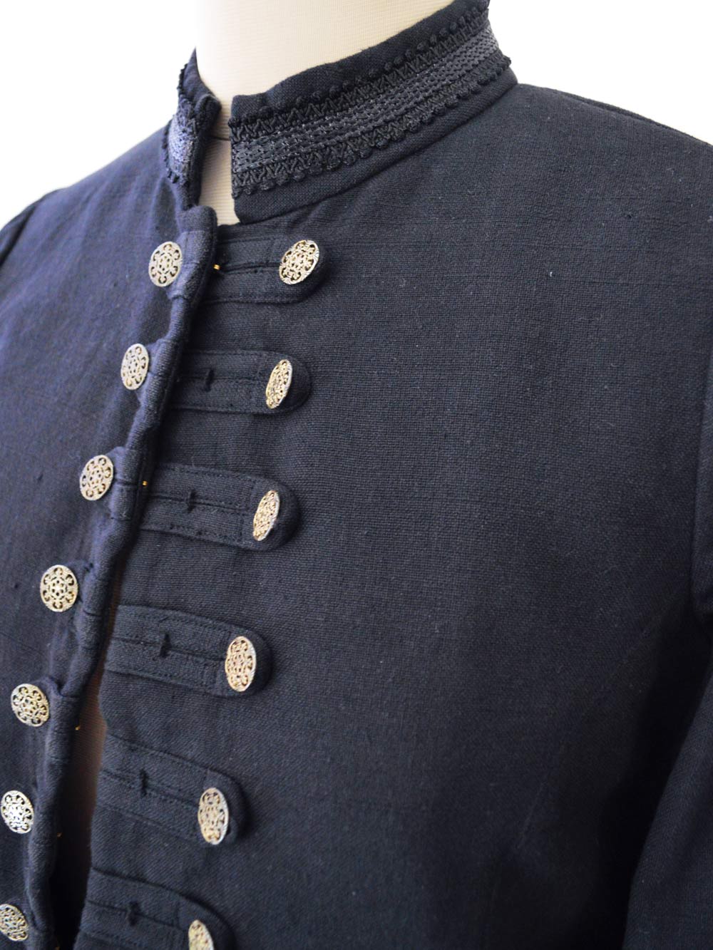 close up view of the details of the Handwoven Mandarin coat for women, designed by Khumanthem Atelier
