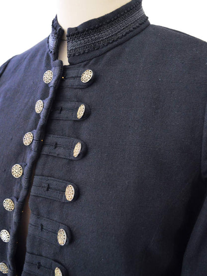 close up view of the details of the Handwoven Mandarin coat for women, designed by Khumanthem Atelier