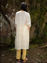 Load image into Gallery viewer, Model wearing Handwoven Dolman sleeves cotton tunic, designed by Khumanthem Atelier, Back view