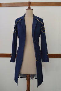 close up front view of Handwoven Trench coat with golden trims, designed by Khumanthem Atelier 