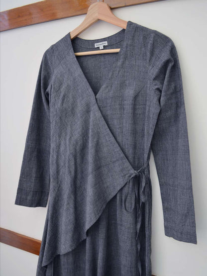 close up view of the upper part of the V-neck jumpsuit with tie-up waist, designed by Khumanthem Atelier