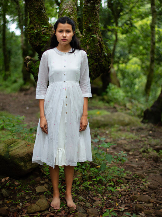 model wearing Handwoven Gathered hem quarter sleeves cotton dress, designed by Khumanthem Atelier, front view