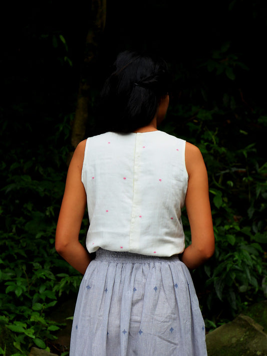 Back view of model wearing Handwoven Back hooks sleeveless top, designed by Khumanthem Atelie