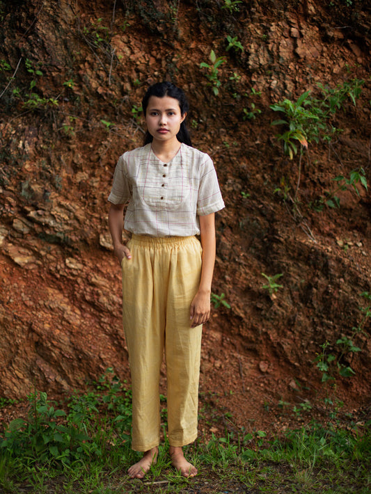 Handwoven cotton top with pleated bib, designed by Khumanthem Atelier