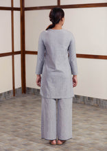 Load image into Gallery viewer, Back view of Full view of model posing with Handwoven cotton High low hem straight top, full sleeves designed by Khumanthem Atelier