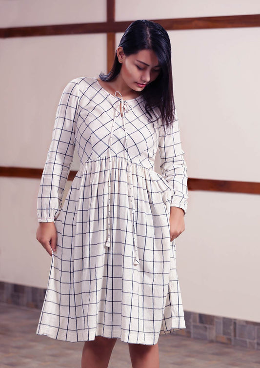 Handwoven Checked peasant dress with running stitch design, unbleached white, designed by Khumanthem Atelier