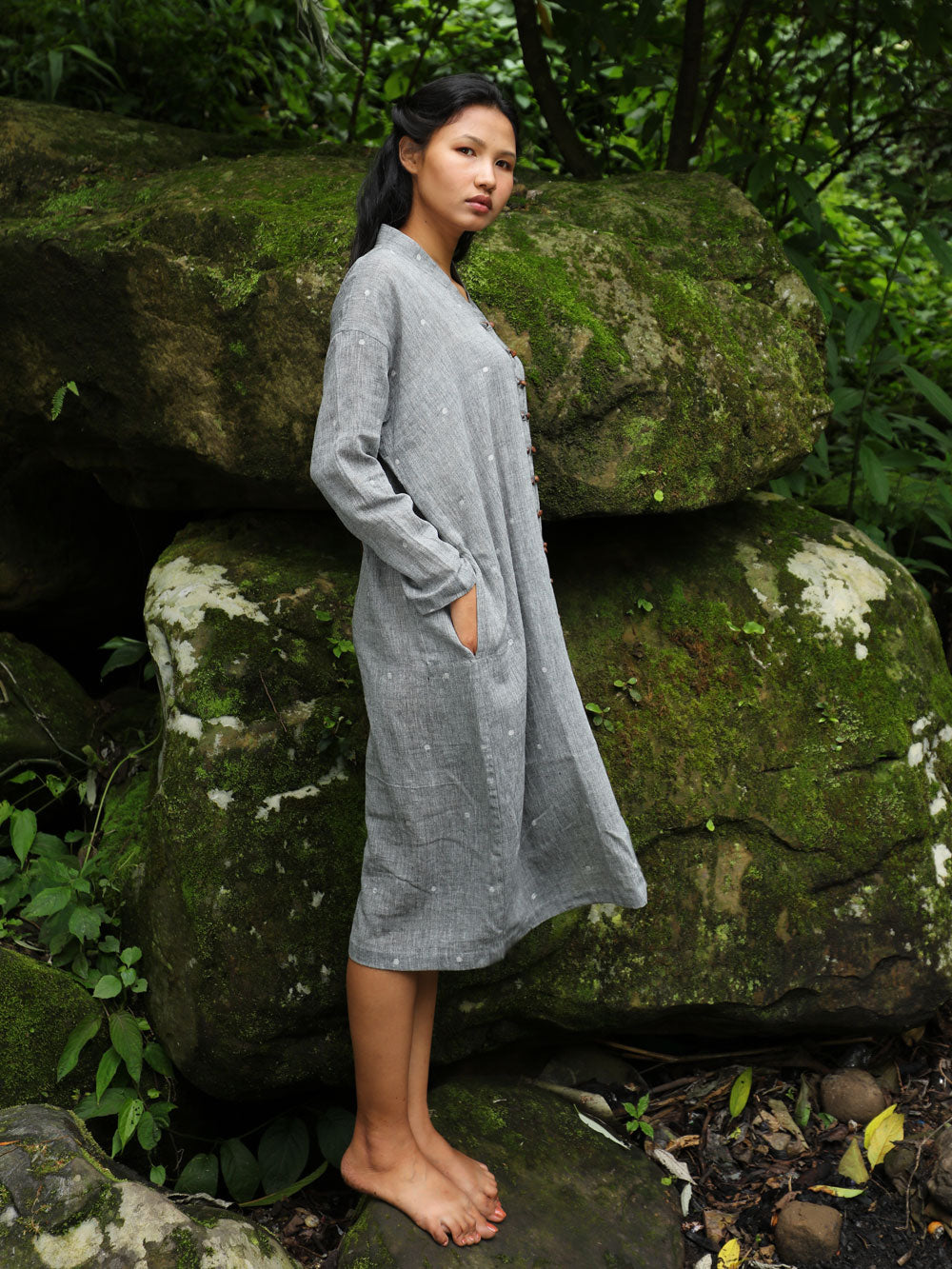 Model wearing Handwoven Cotton Tunic Dress- Cheongsam inspired, designed by Khumanthem Atelier, side view