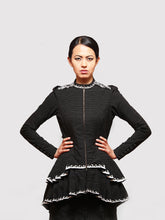 Load image into Gallery viewer, Front view of model posing with Black and gold stripe High- low tiered Jacket with applique work designed by Khumanthem Atelier