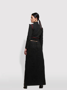 Side view of Cropped Pinstripe Jacket with matching box pleated maxi skirt