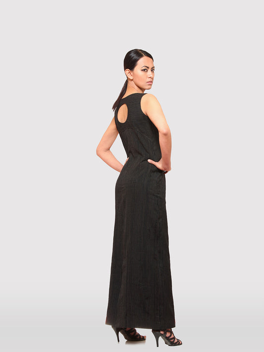 Model posing wearing Handwoven Cut-out Back sleeveless Maxi dress designed by Khumanthem Atelier