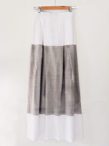 Back view of white cotton Pleated skirt with stripes, designed by Khumanthem Atelier