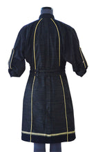 Load image into Gallery viewer, Back view of hanger shoot of Double Belt Pleated overcoat with black and golden stripes designed by Khumanthem Atelier