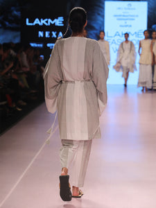 Ramp walk back view of model wearing Handwoven Kimono Sleeve Coat, made from cotton, designed by Khumanthem Atelier, during Lakme Fashion Week, 2018